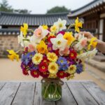 다양한 색상의 수선화와 프리뮬러 꽃다발
